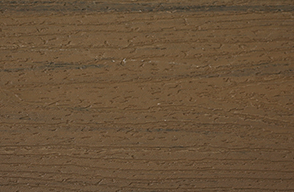 A close up of a piece of wood showing the texture of the wood.