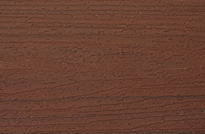 A close up of a piece of brown wood.