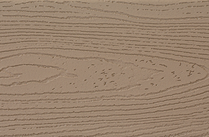 A close up of a piece of wood with a grain pattern.