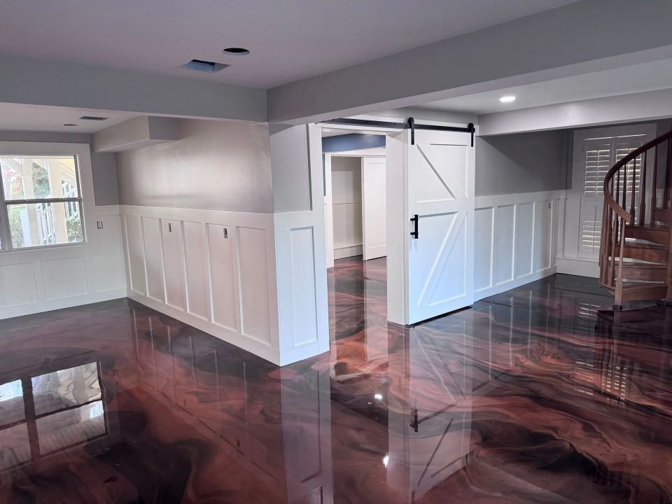 Gray speckled epoxy floor in a garage.