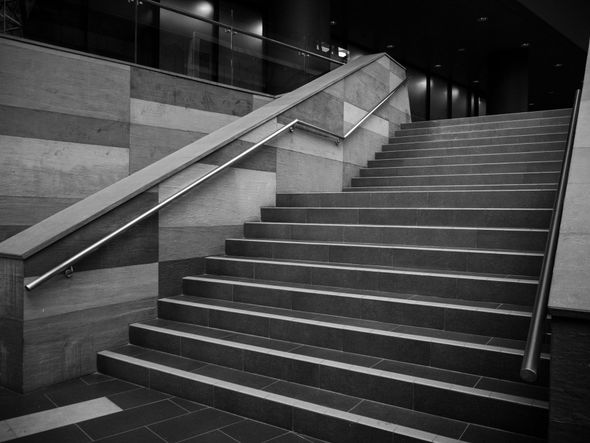 A black and white photo of a set of stairs