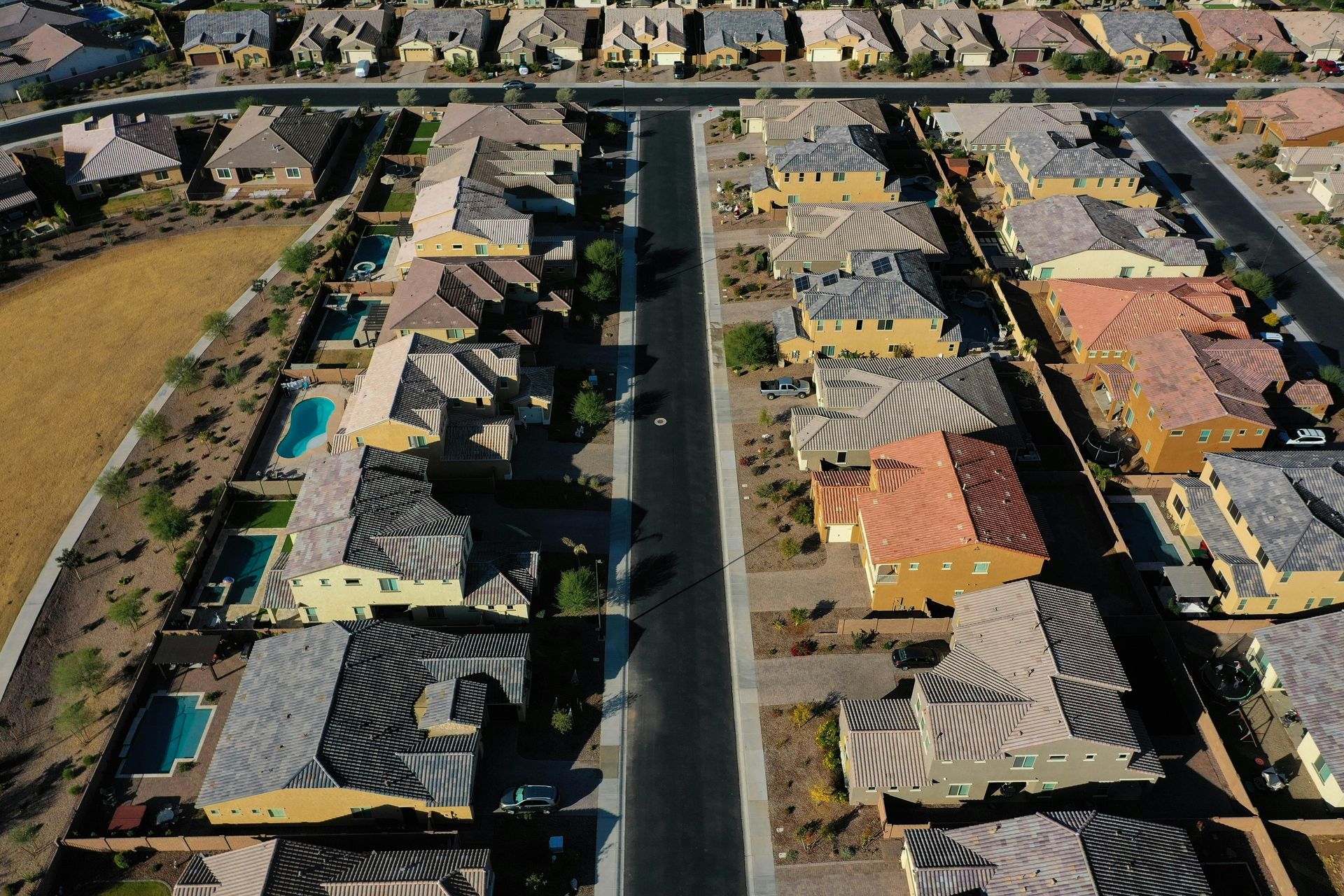 An aerial view of a residential area with lots of houses