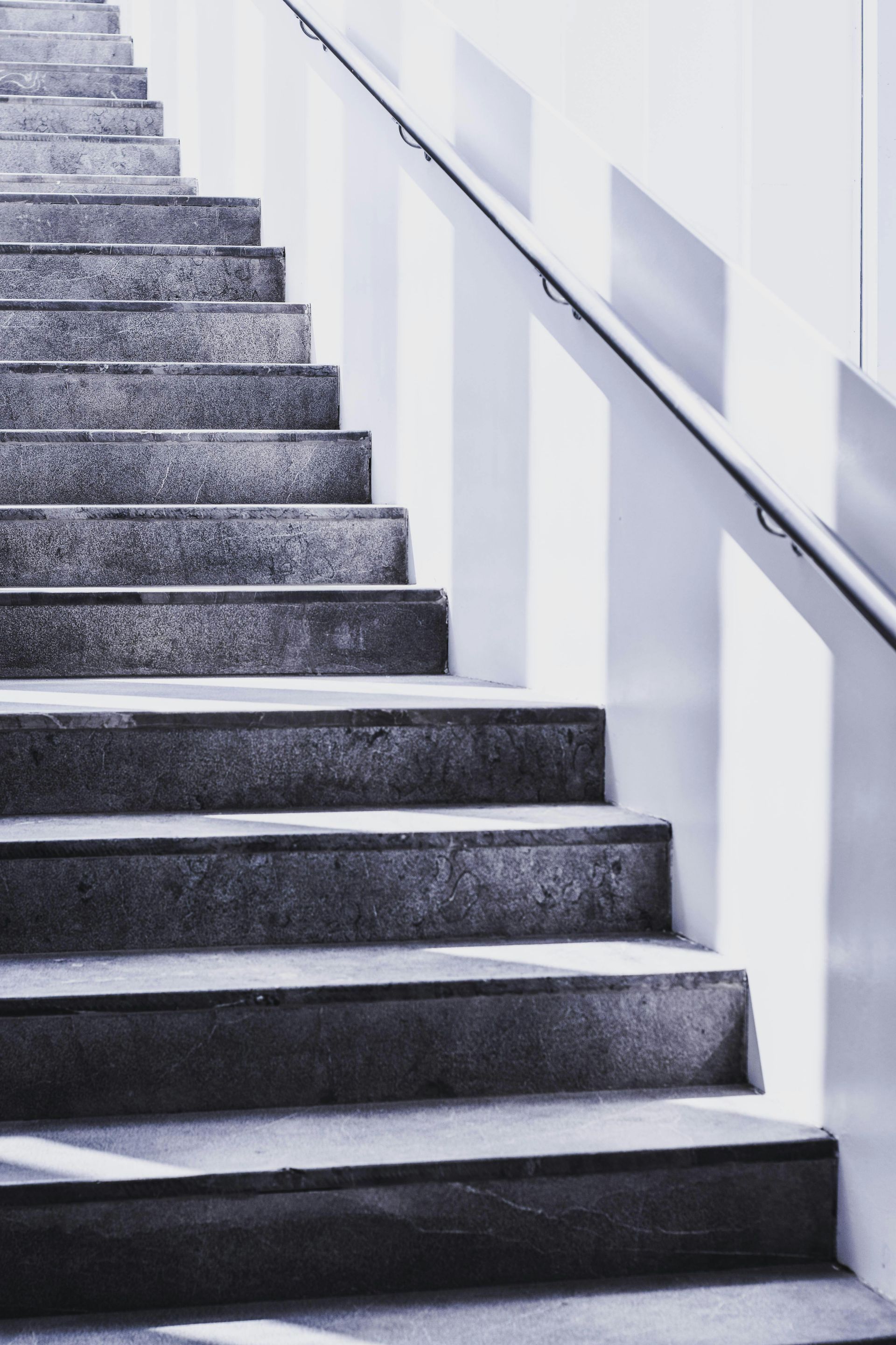 A black and white photo of a set of stairs