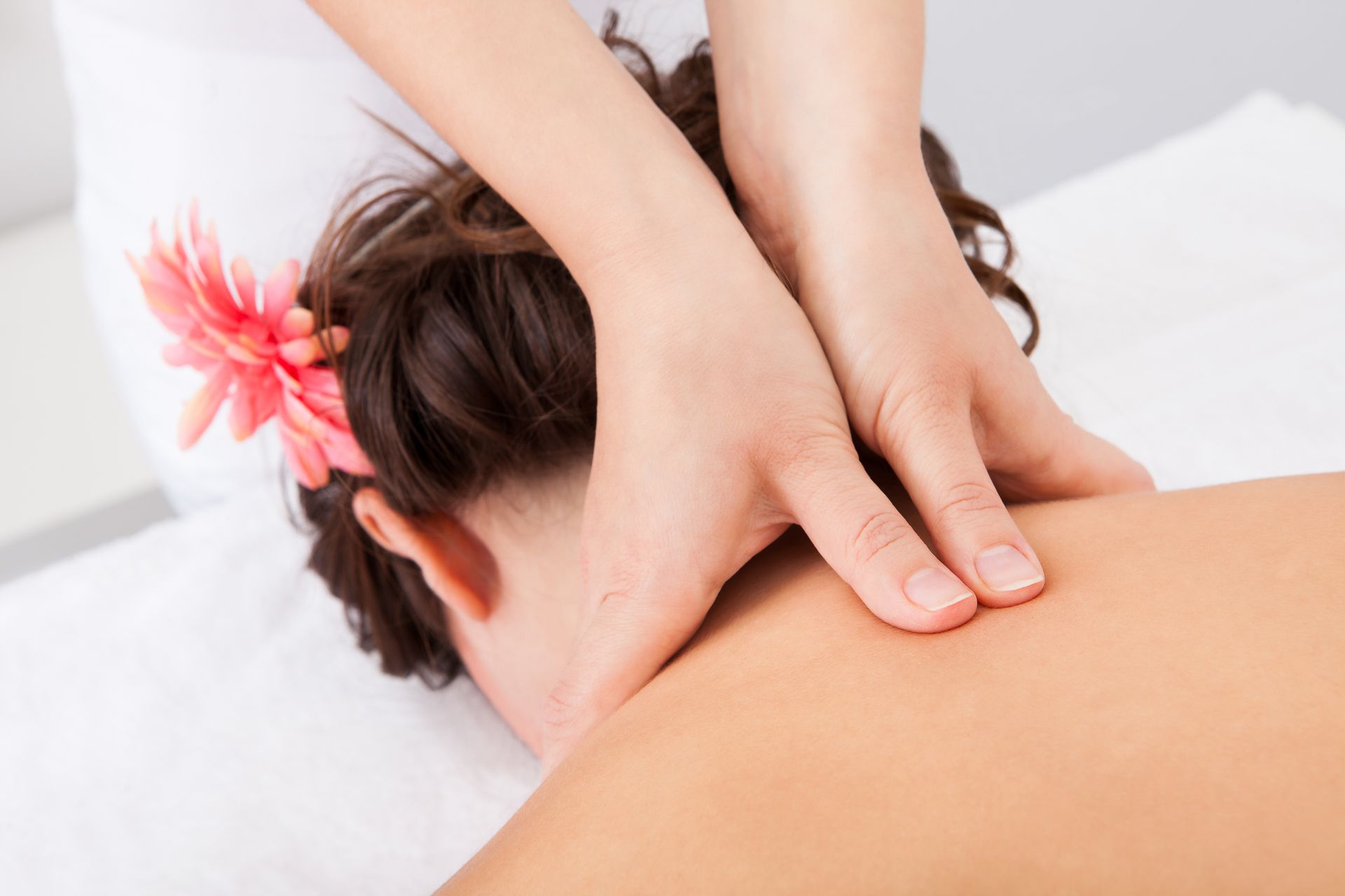 Hands massaging a person's neck and shoulders - Thames, NZ - Thai Classic Massage Thames