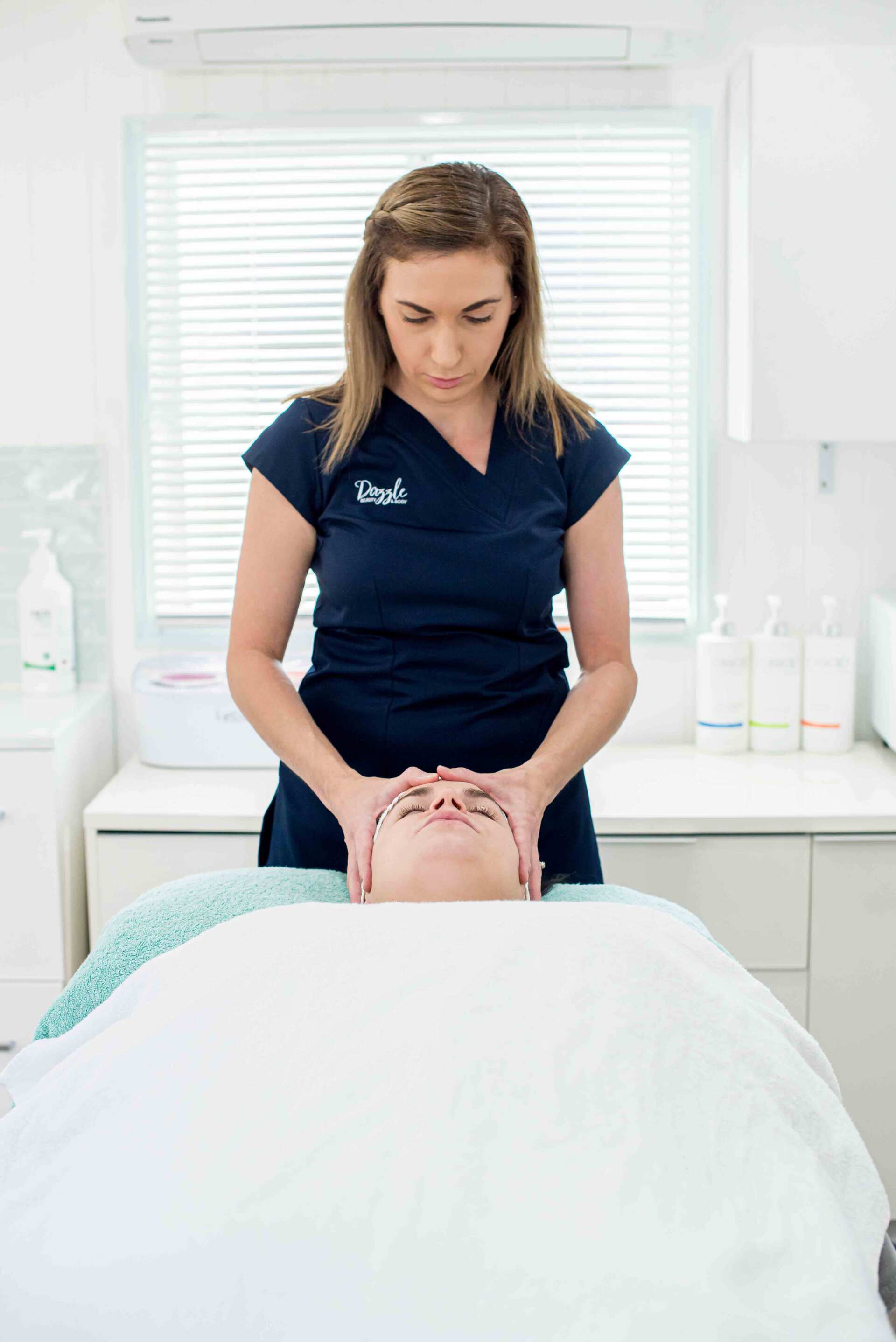 A Girl Having a Head Massage — Beauty Salon in Bundaberg, QLD