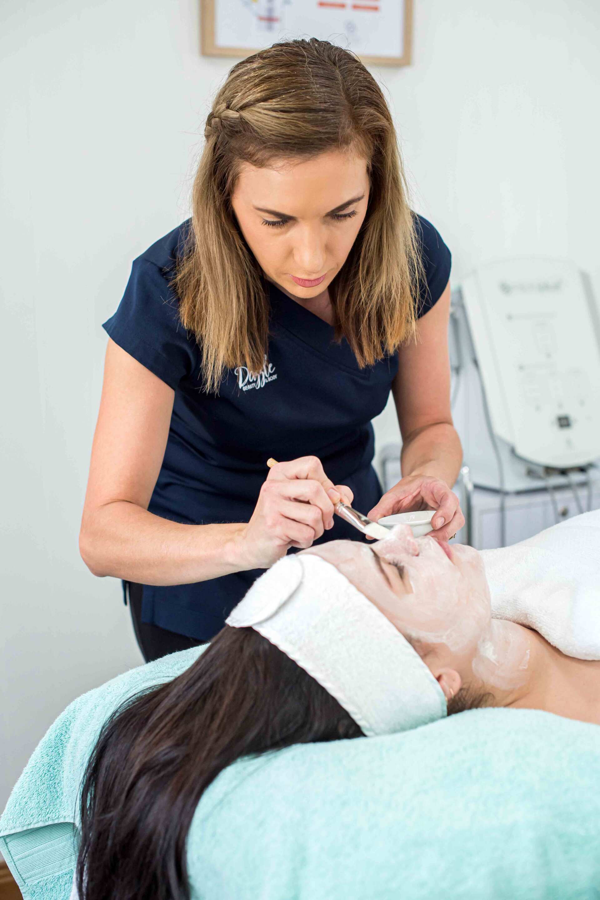 A Girl Having a Facial Treatment — Beauty Salon in Bundaberg, QLD