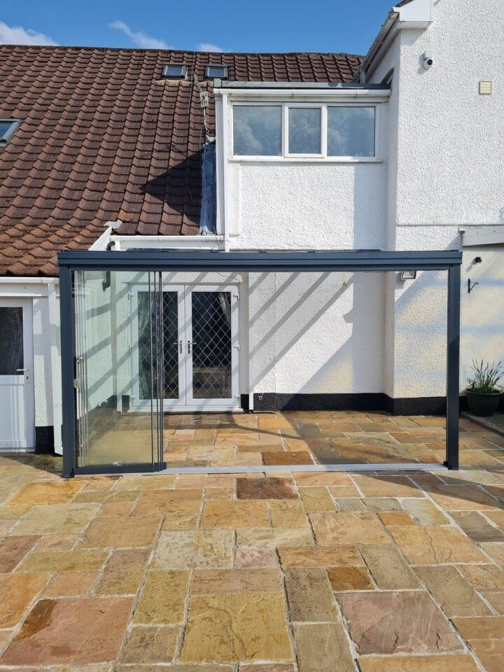 A house with a patio and a sliding glass door