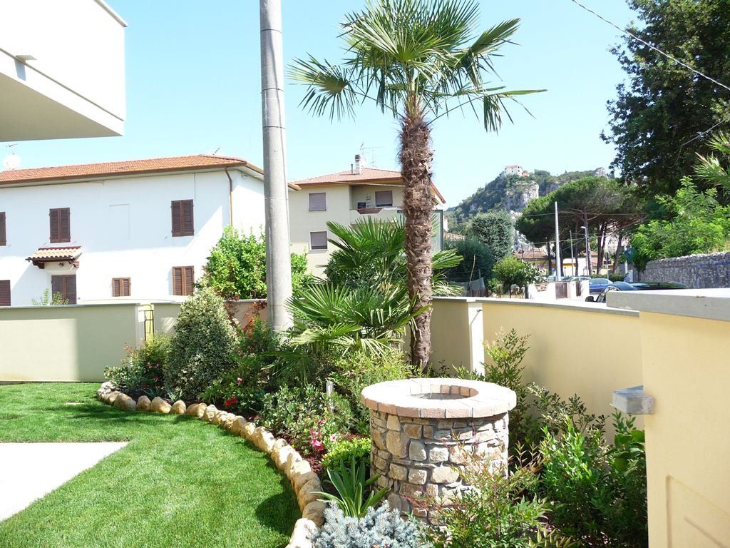 pozzo in muratura in giardino