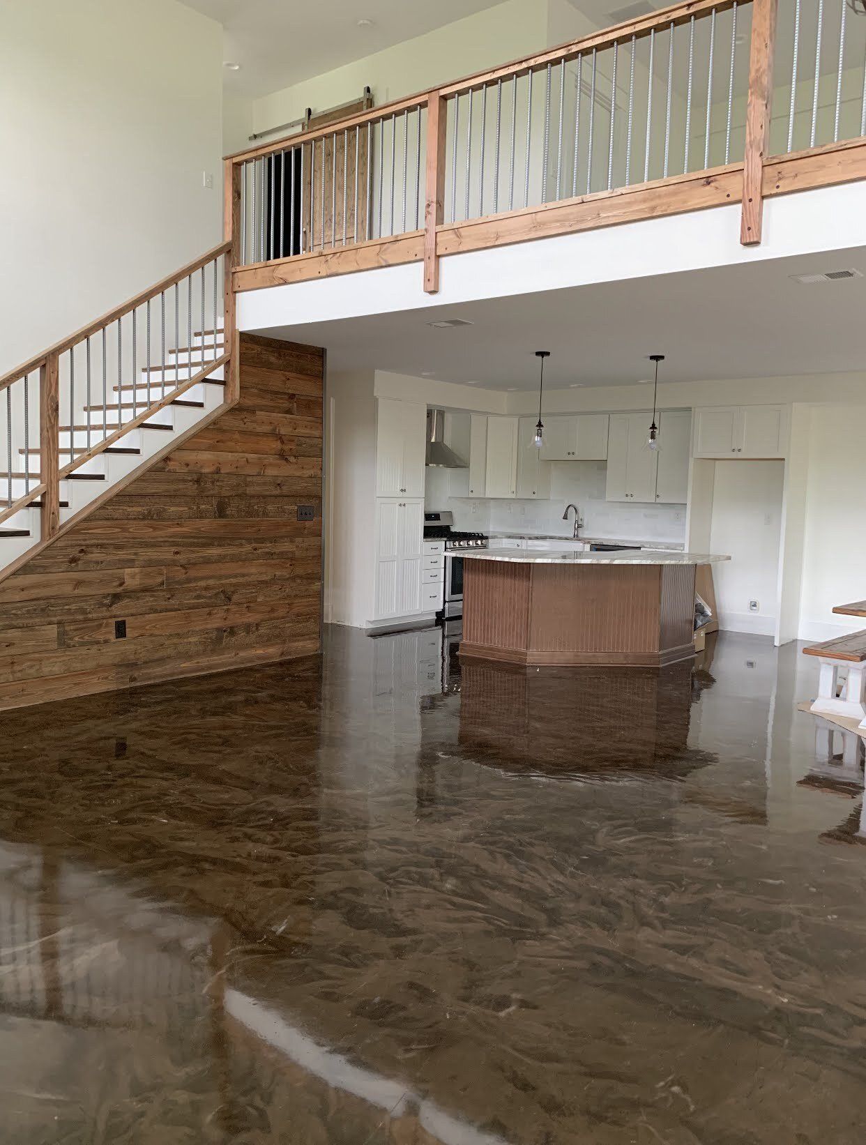 There is a staircase leading up to the second floor of the house.