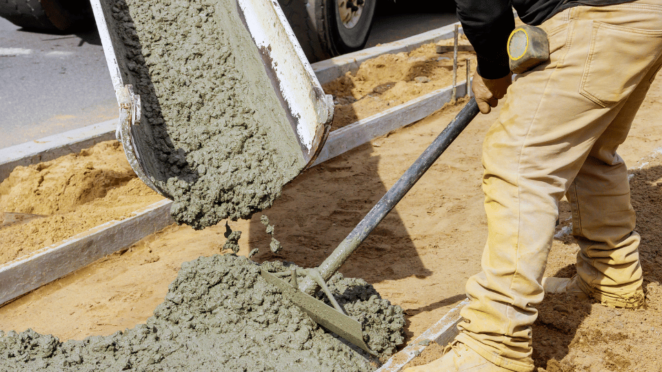 Man Pouring Concrete