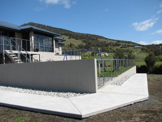 backyard with concrete stucco fence