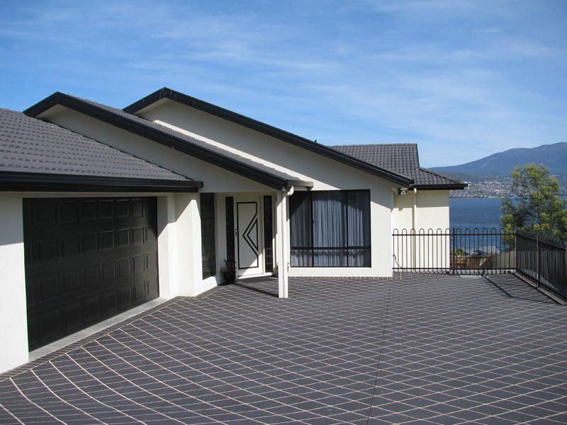 patio driveway with black garage door