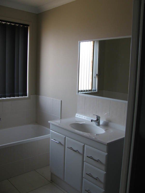bathroom vanity and tub