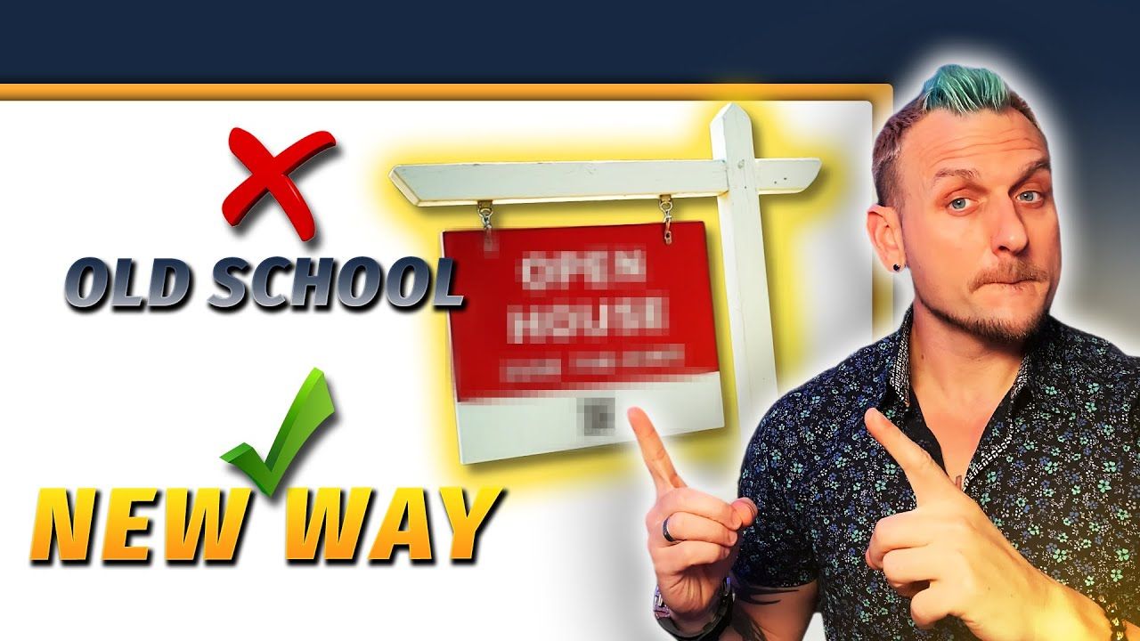 A man points to an open house sign next to an old school sign