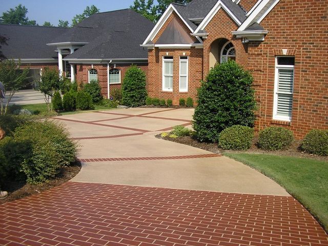 Driveway Overspray With Brick Borders — Easley, SC — Landmark Concrete Designs Inc.