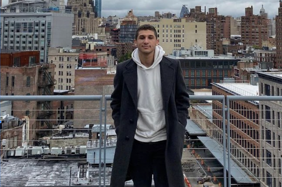 Brandon Winter, Executive Producer at Sol Creative Agency, with the New York City skyline.