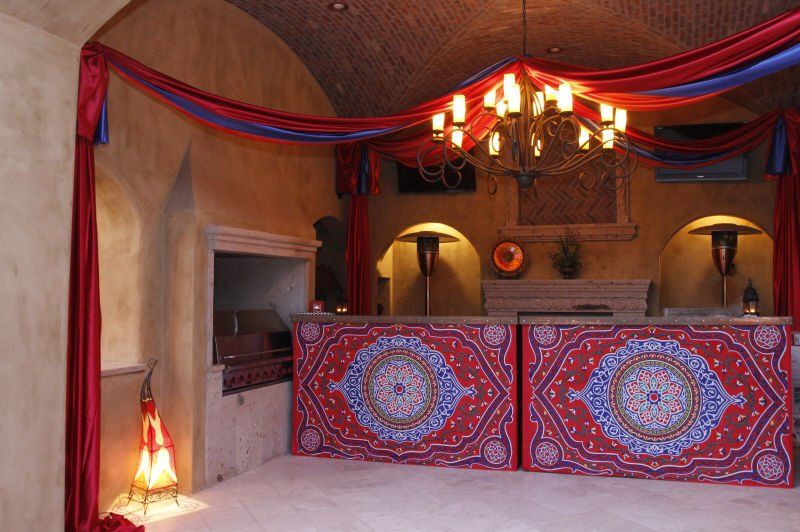 Tents and canopies image showing a canopied bar decorated and lit in a Moroccan style
