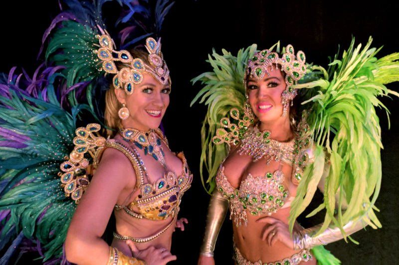 Specialty acts image showing two fully costumed carnival samba dancers