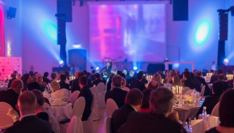 Image of a large corporate dinner event