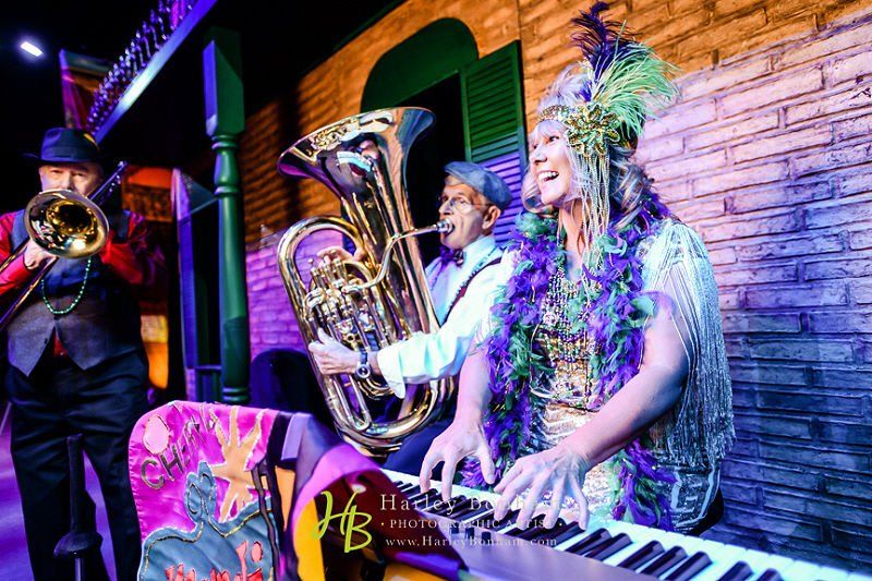 Band and DJs image showing a live Mardi Gras style band