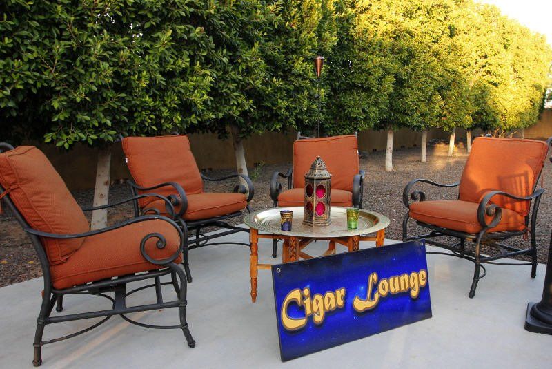 Activity and Lounge areas image showing a party cigar lounge seating and table arrangement