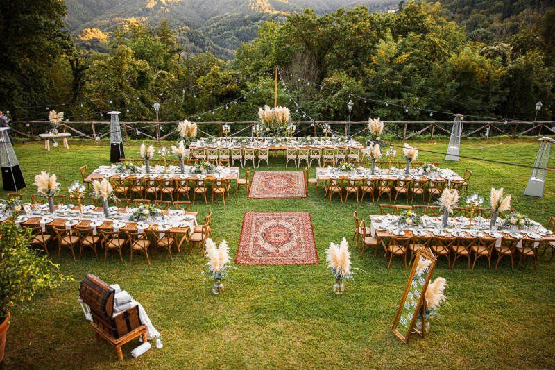Wedding celebration rustic styled outdoor seating arrangement