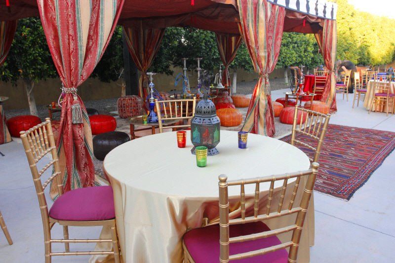 Seating and tables image showing Arabian themed seating and canopy setup