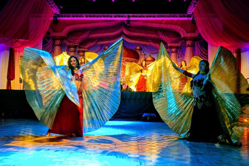 Stage Shows entertainment image showing performance of winged belly dancers