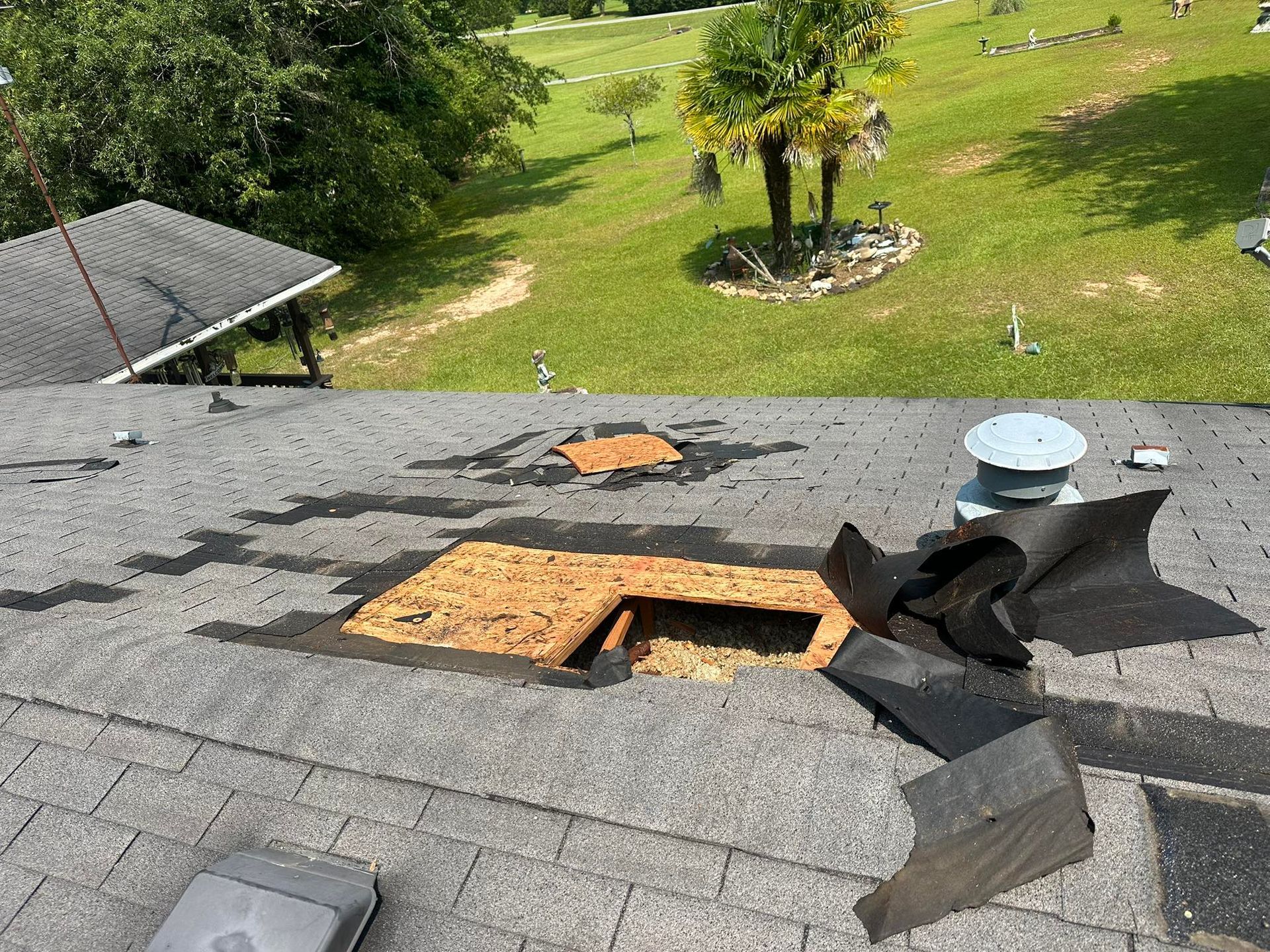 A roof with a hole in it and a hole in the roof.