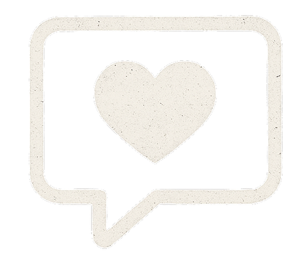 A white robot with green arms is holding a sign