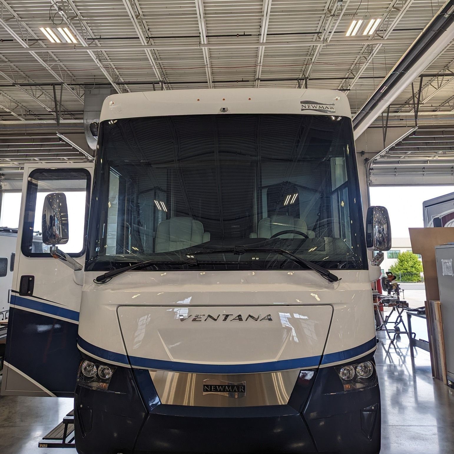 A montana rv is parked in a garage