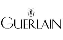 The logo for guerlain is black and white and has a bee on it.