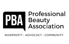 The logo for the professional beauty association is black and white.
