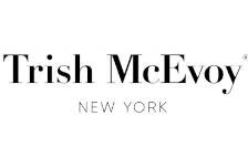 The logo for trish mcevoy new york is black and white.