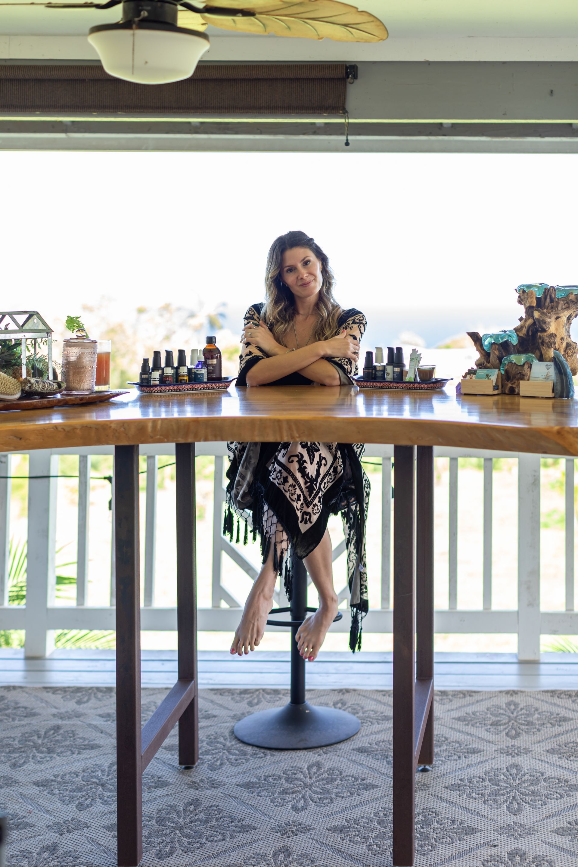 provider sitting at desk with holistic treatments for mental and sexual health