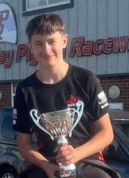 Photo of a team driver outside clay pigeon raceway 