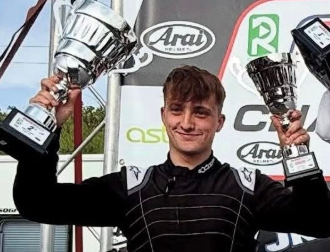 photo of a team driver on the podium at super one