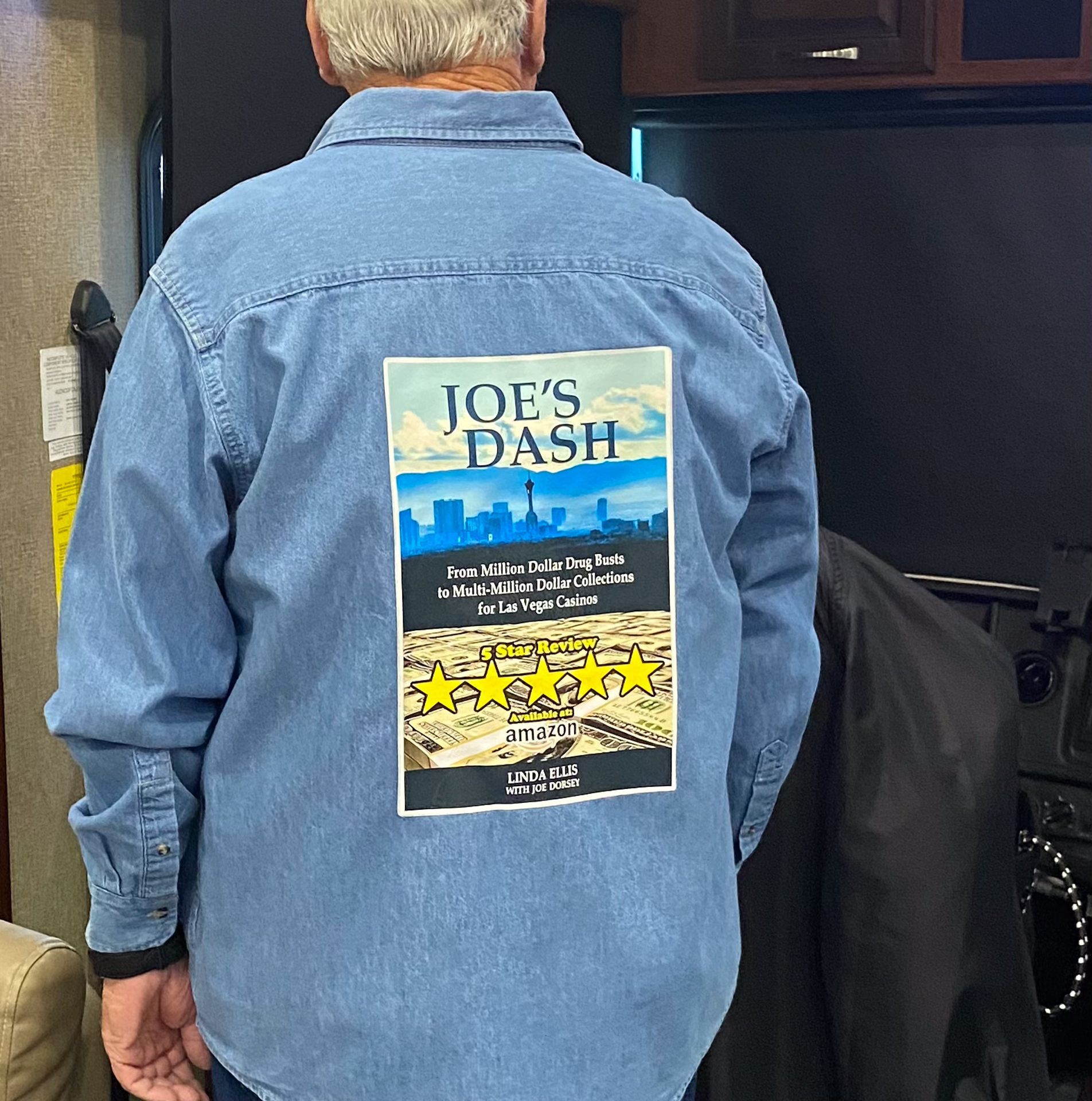 Hard Cover of Joe's Dash Book Imprinted on the back of a Denim Jacket