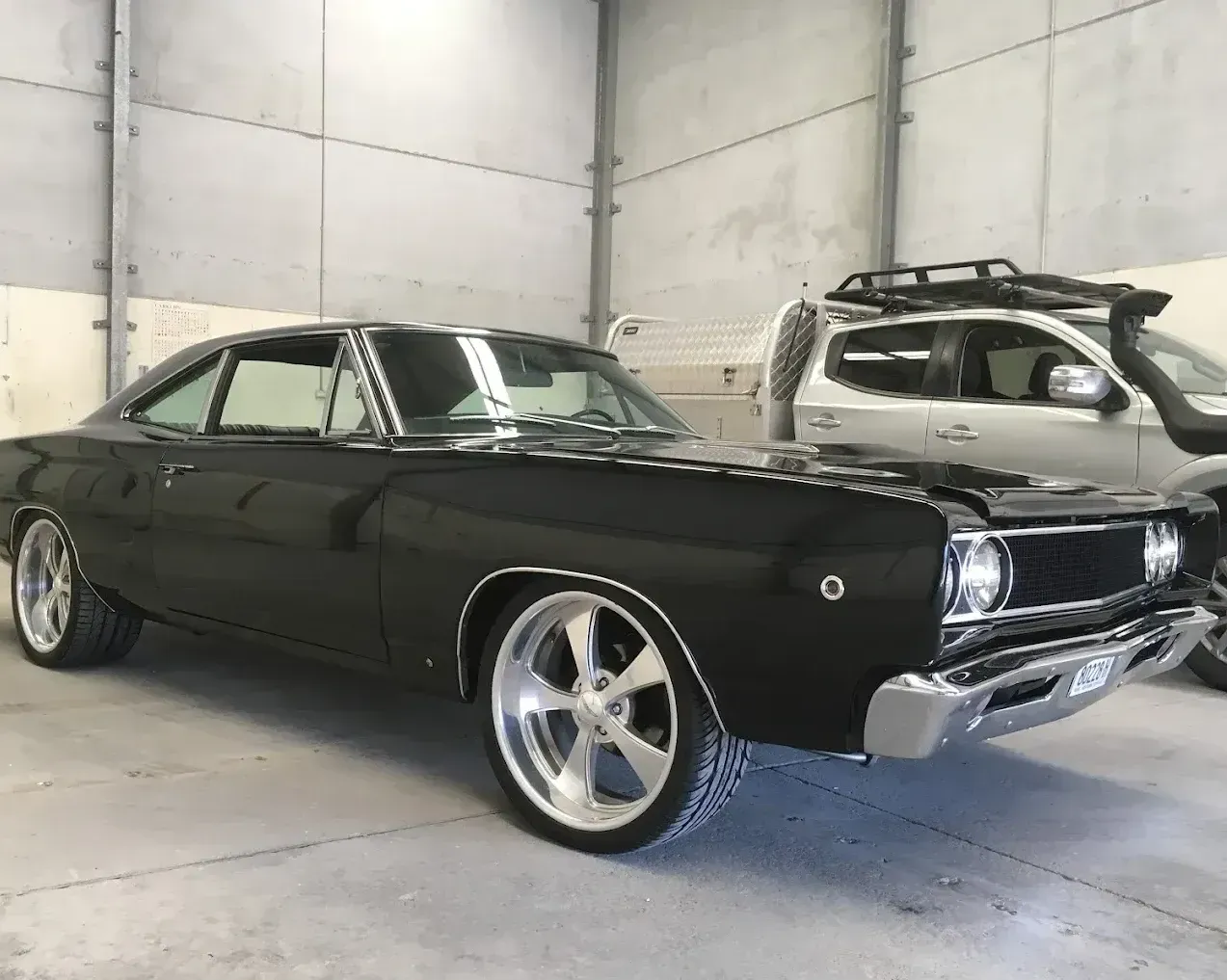 A black Car Parked in a workshop— Chris Bale Automotive in Toronto, NSW