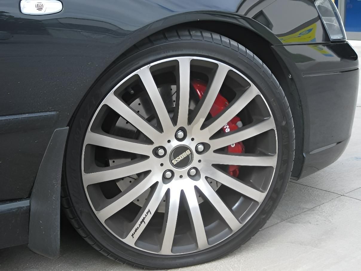 A Close up Of a Car Wheel with A Mercedes Logo on It — Chris Bale Automotive in Toronto, NSW