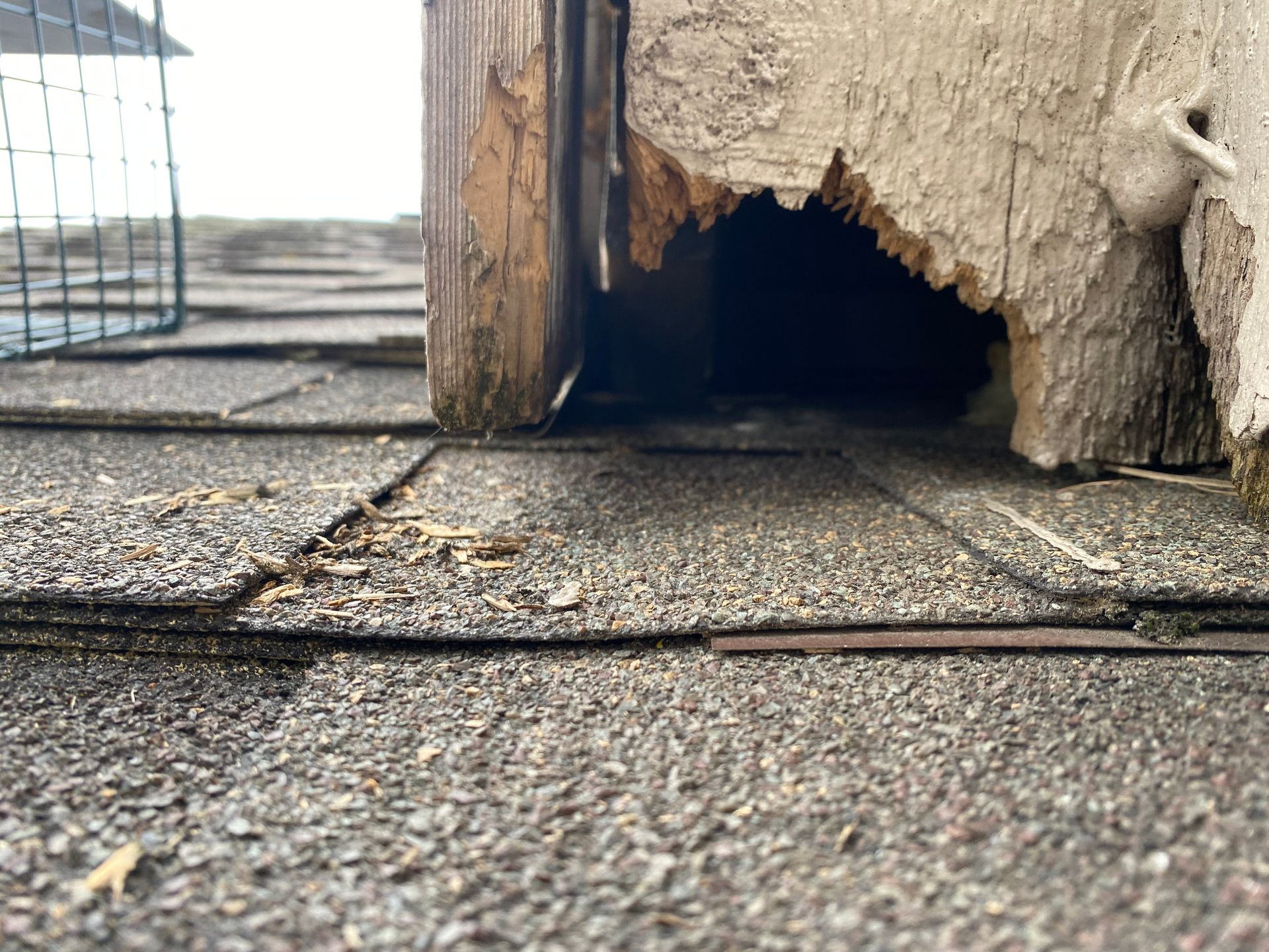 There is a hole in the roof of a building.