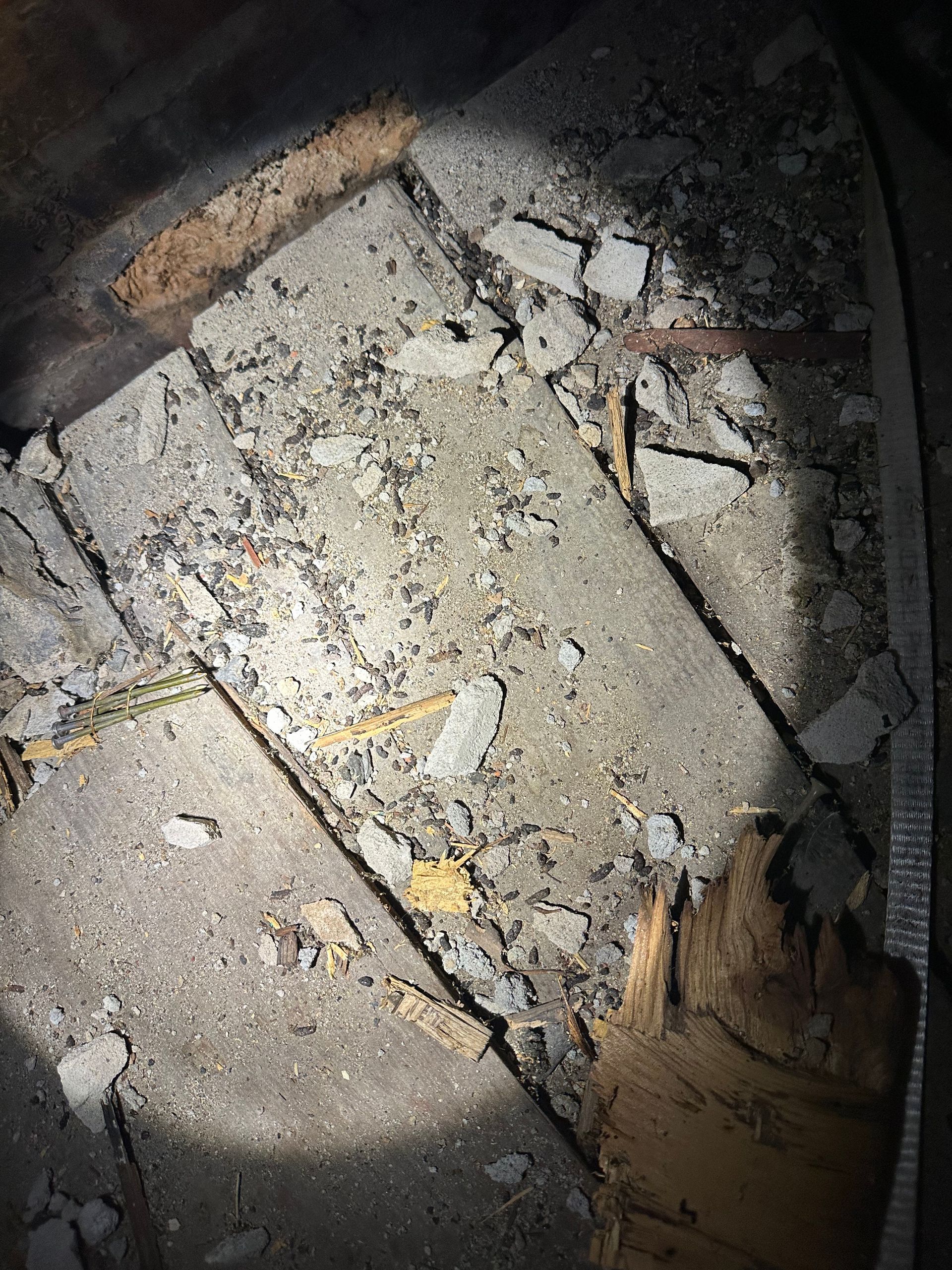 A close up of a piece of concrete with a flashlight on it.