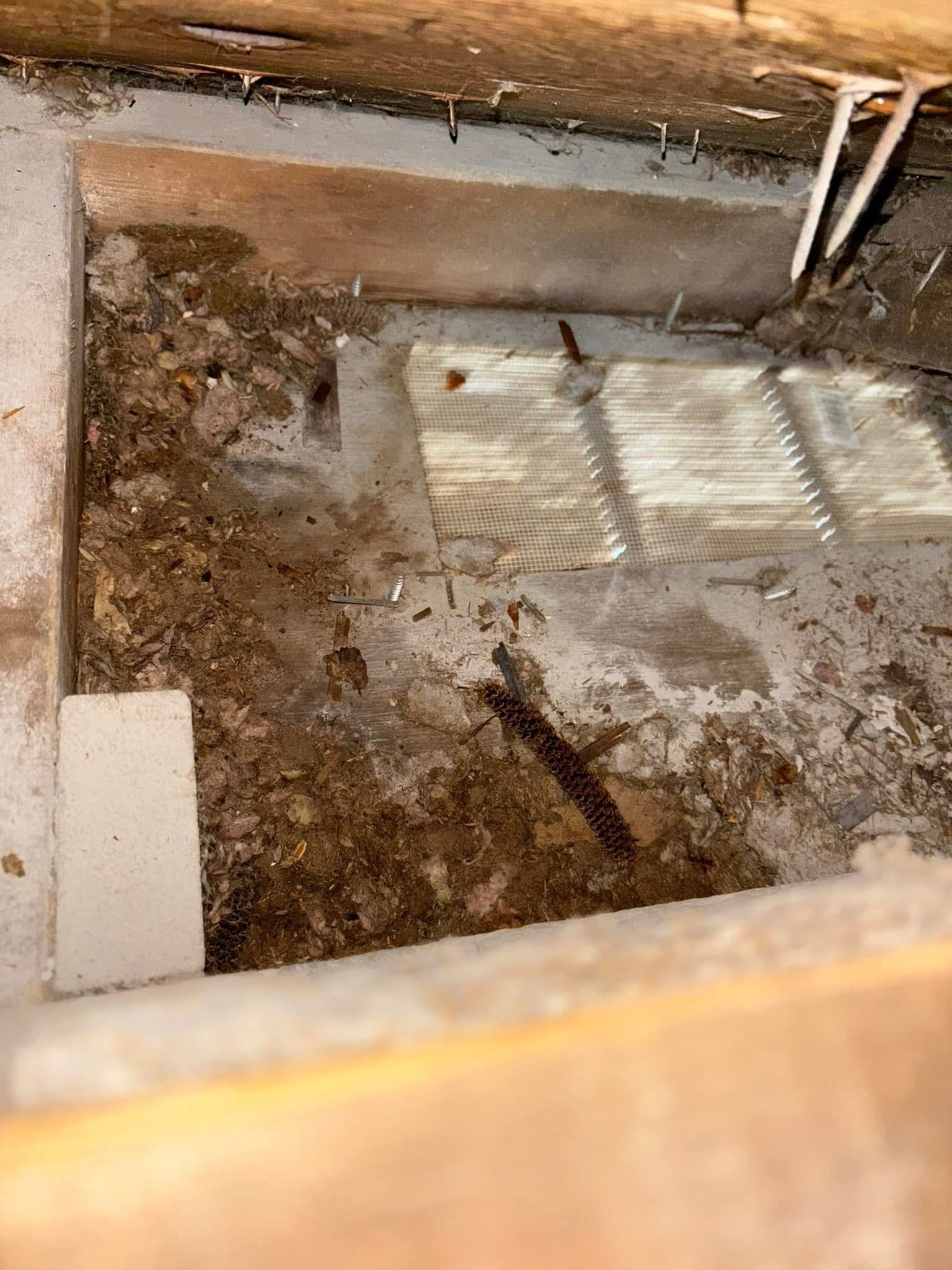 A close up of a hole in the floor of a building.