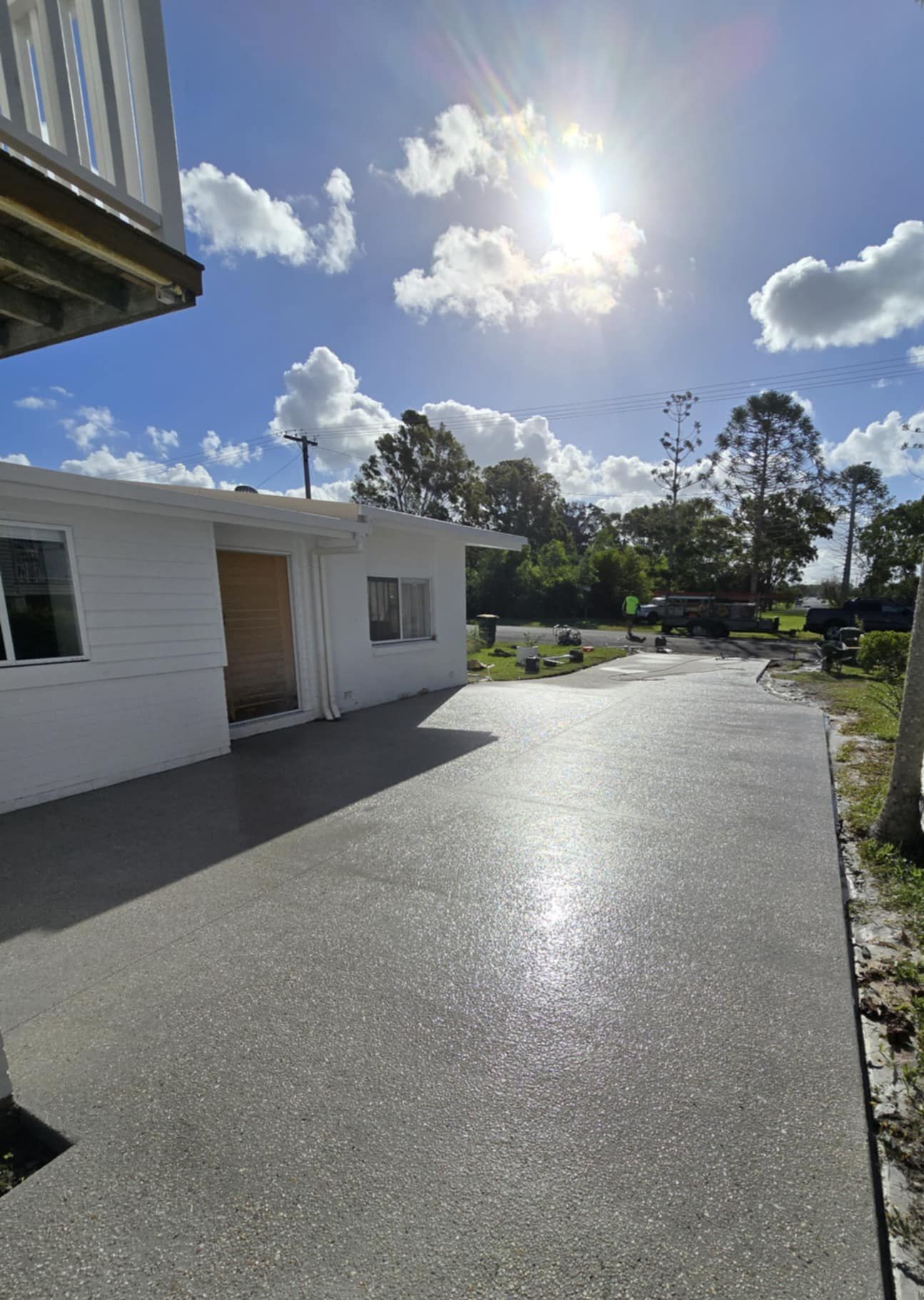 A Concrete Driveway Is Being Built In Front Of A House — C & A Concreting In Craignish, QLD