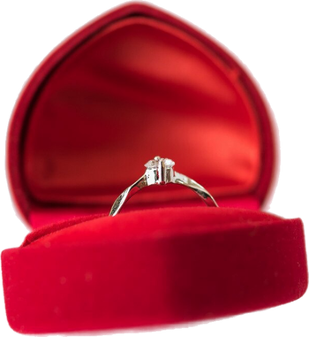 Diamond engagement ring in a red velvet ring box