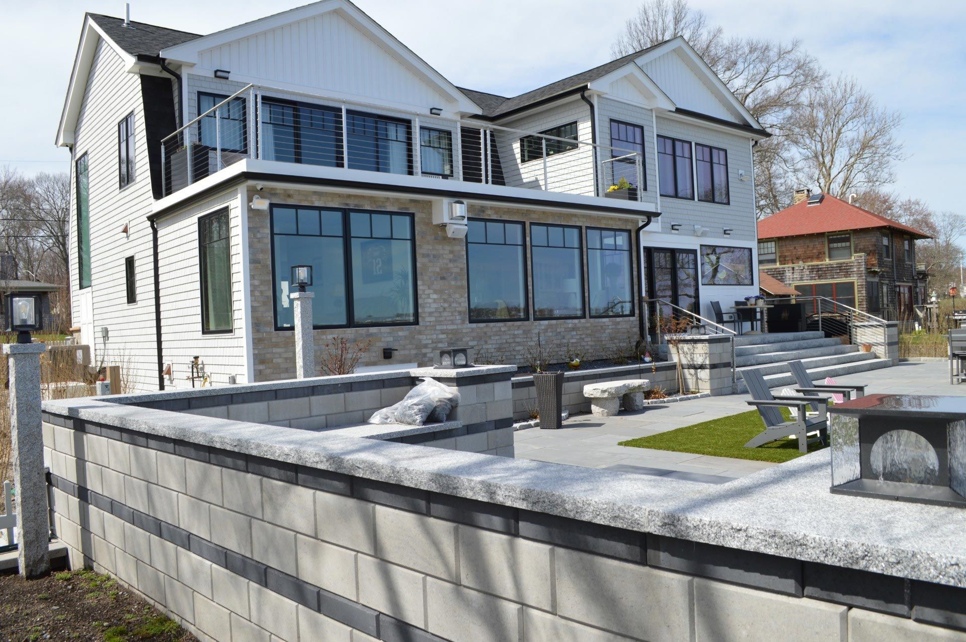An air conditioner is sitting outside of a brick building