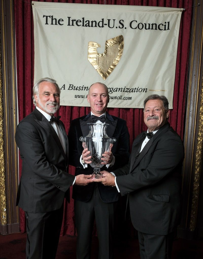two Ireland-U.S. council members with award recipient Dermot Desmond