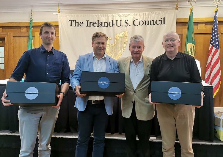 two Ireland-U.S. council members with award recipient Dermot Desmond