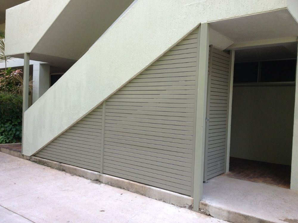 A Building with Stairs Going up To the Second Floor — North Queensland Glass & Glazing In Cannonvale, QLD
