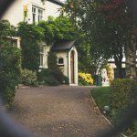 A view of a house through a magnifying glass.